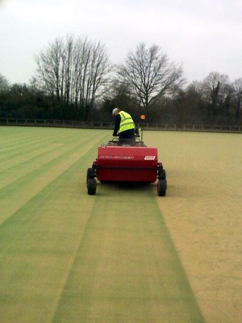 Brushing an artificial pitch